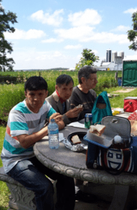 Participants enjoying a picnic lunch on their trip
