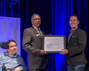 (L-R,) Self-Advocate Council representative of the Board of Directors, Nelson Raposo, President of the Board, Victor Figueiredo, and CEO of Community   Living Ontario, Chris Beesley. 